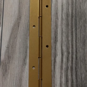 Zawias taśma meblowa BAUSTER kolor złoty długość 1m szerokość 3,5cm odległość między otworami 6,6cm. 8 sztuk.